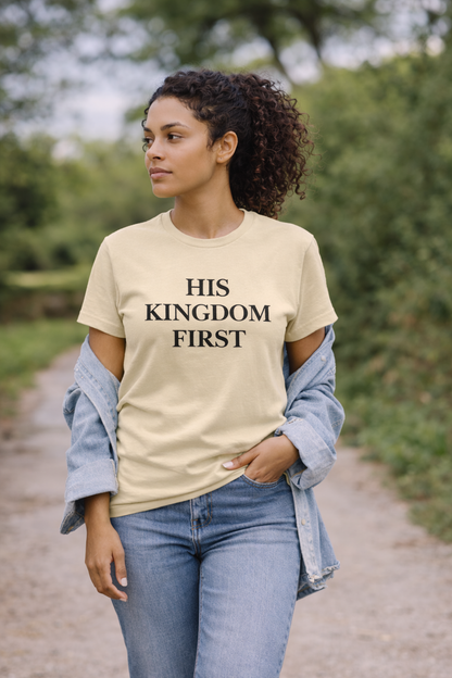 His Kingdom First Christian t-shirt in cream worn by a woman outdoors
