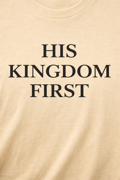 Close-up of “His Kingdom First” print on cream Christian t-shirt
